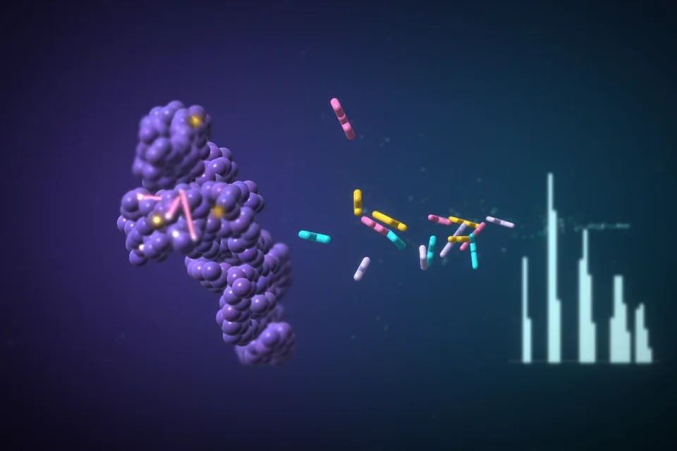 A protein crosslinked and cut by a protease, its peptide fragments streaming into a mass spectrometer